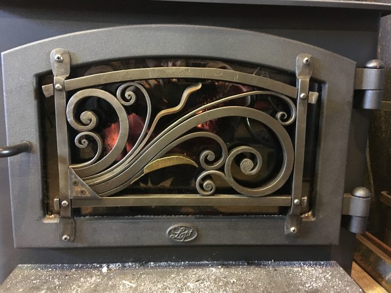protect the glass on your wood stove door with a forged screen.