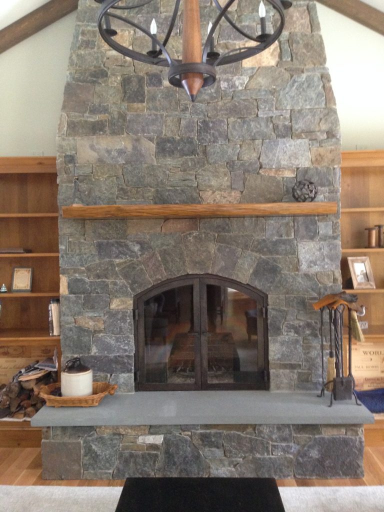 forged fireplace insert installed