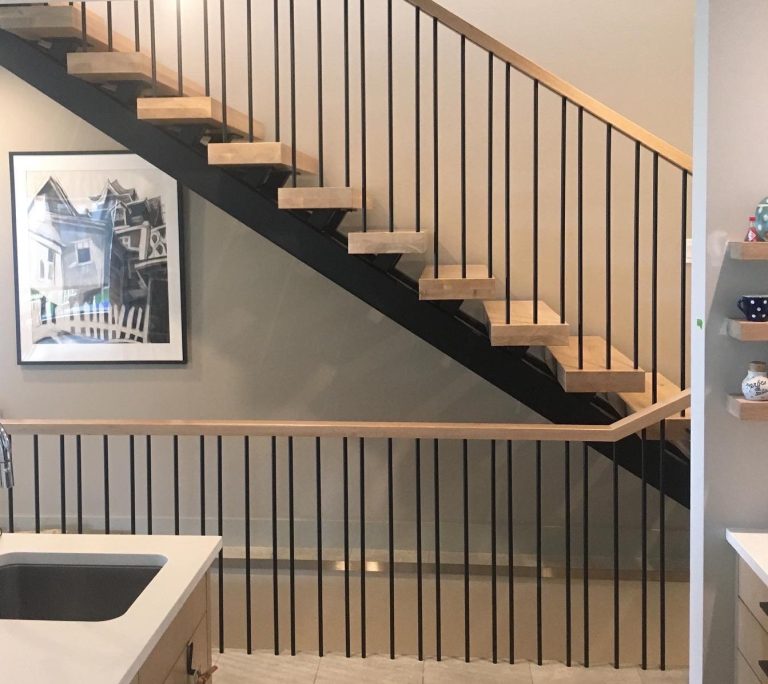 rectangular tube stringers and 5/8" diameter round rod balusters.