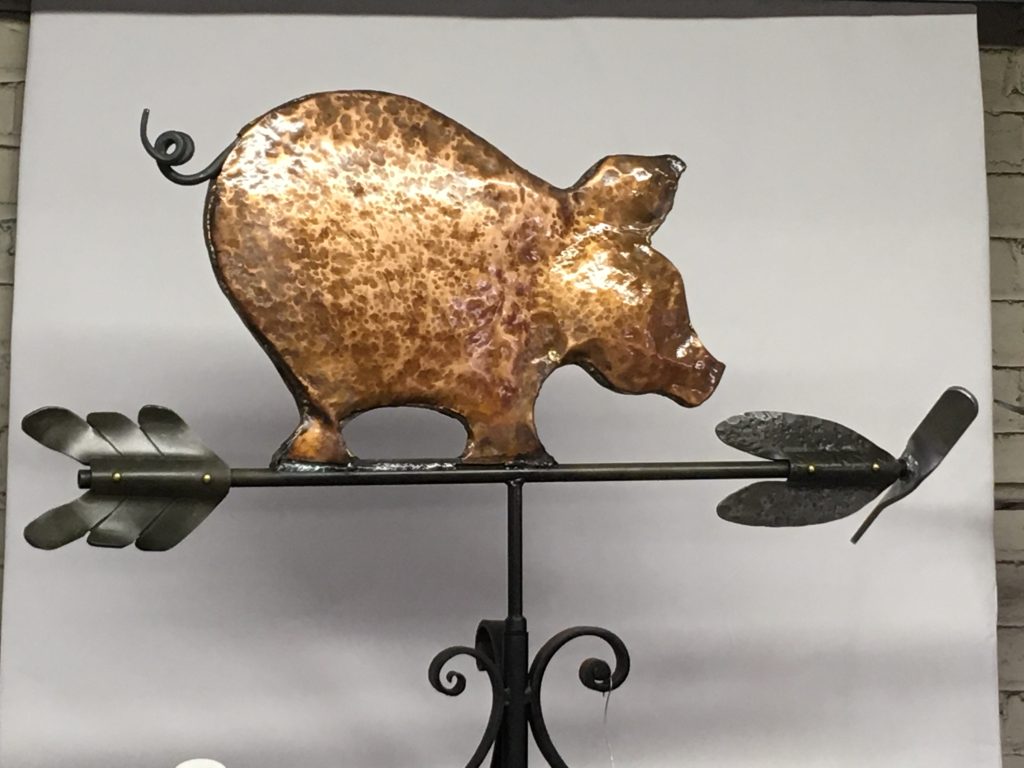 pig whirligig metal sculpture